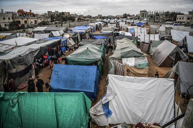 A group of tents in a city

Description automatically generated