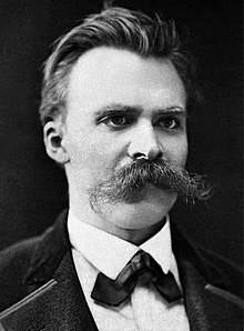 A person with a mustache

Description automatically generated