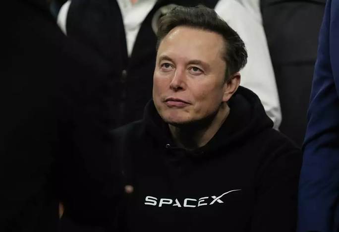 A person in a black sweatshirt

AI-generated content may be incorrect.