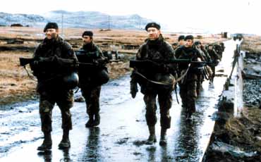 British soldiers march into Port Stanley on the Falkland Islands